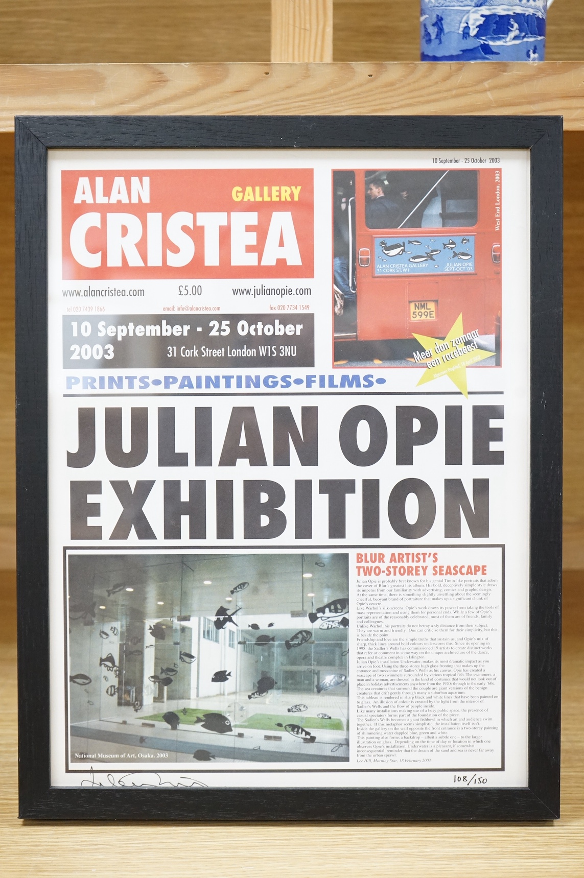 Julian Opie (b.1958), contemporary colour print, Newspaper page ‘Julian Opie exhibition’, signed in ink and limited edition 108/150, 40 x 30cm. Condition - good
